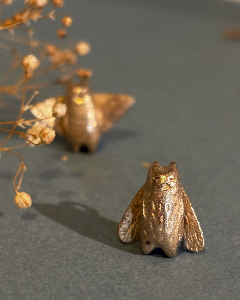 Whimsical bronze cat moth wearable sculptures, to be worn as pendant or pin