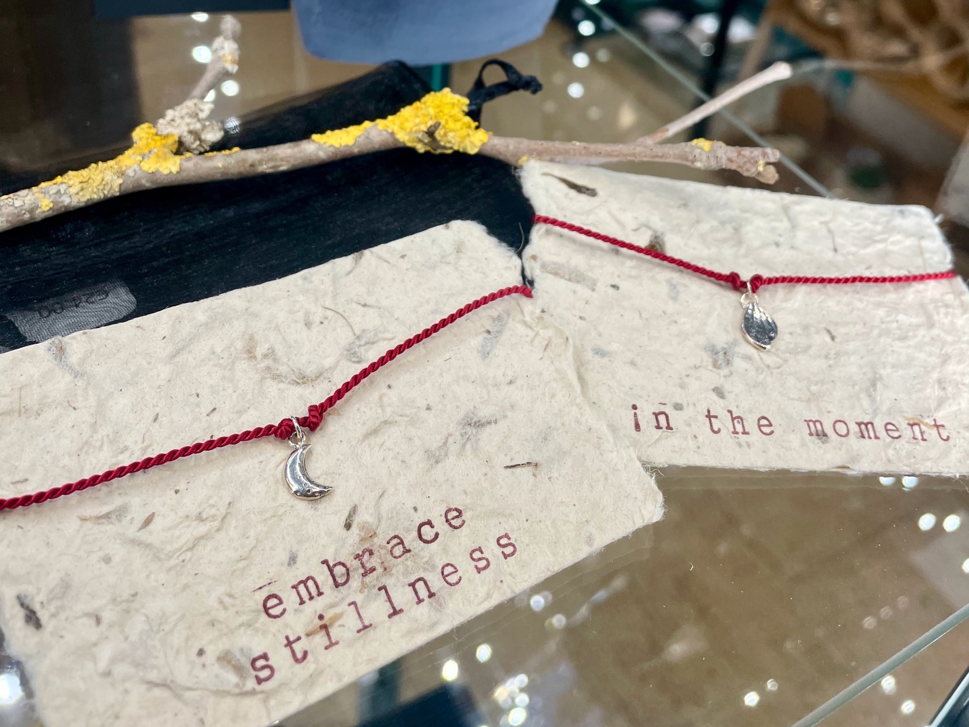 Handmade red silk string bracelet with silver leaf charm, crafted in Ireland, symbol of luck and love
Handmade red silk bracelet with silver bird charm, artisanal Irish jewellery
